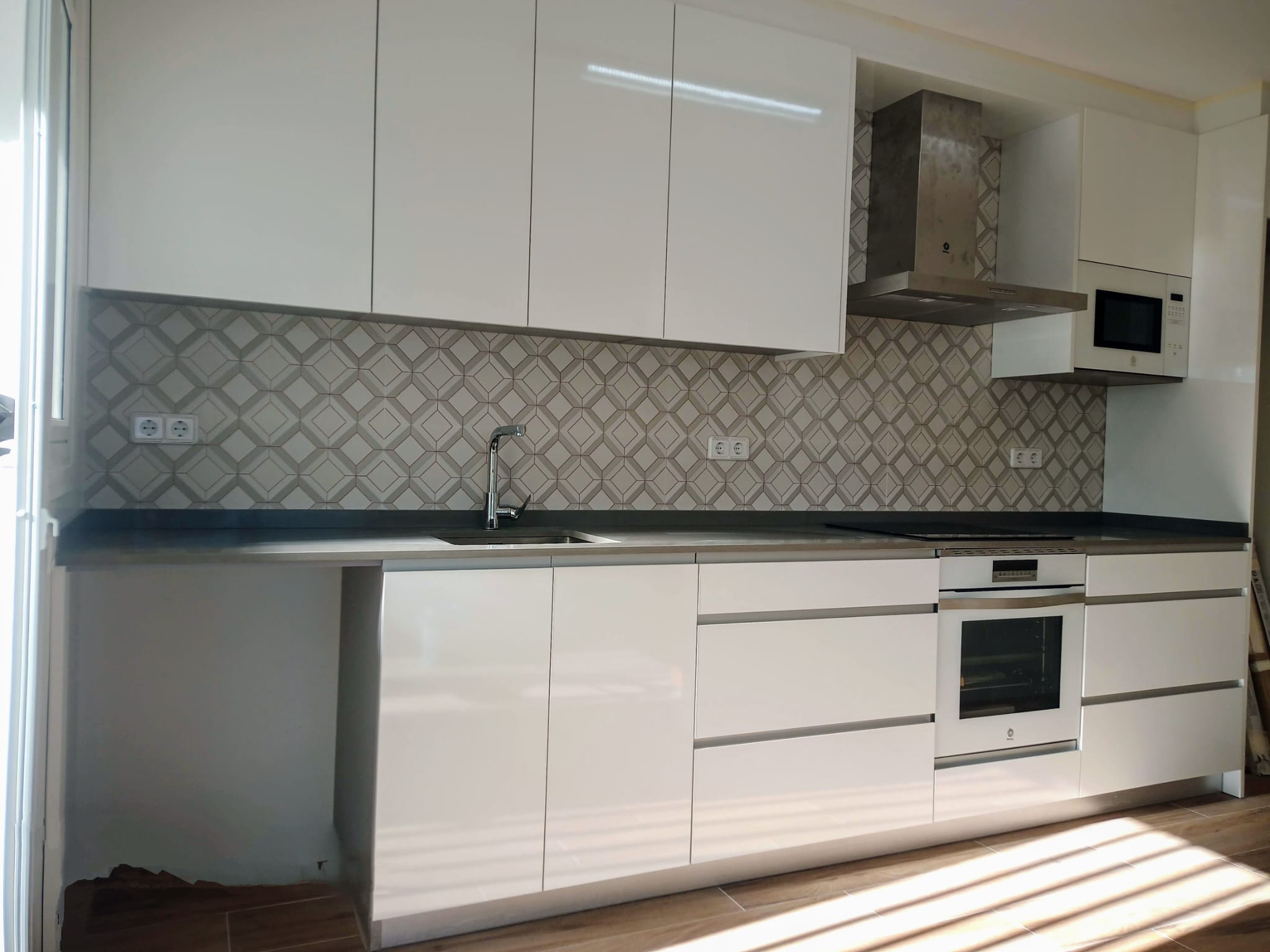 Resultado final de reforma de cocina en vivienda de Cunit